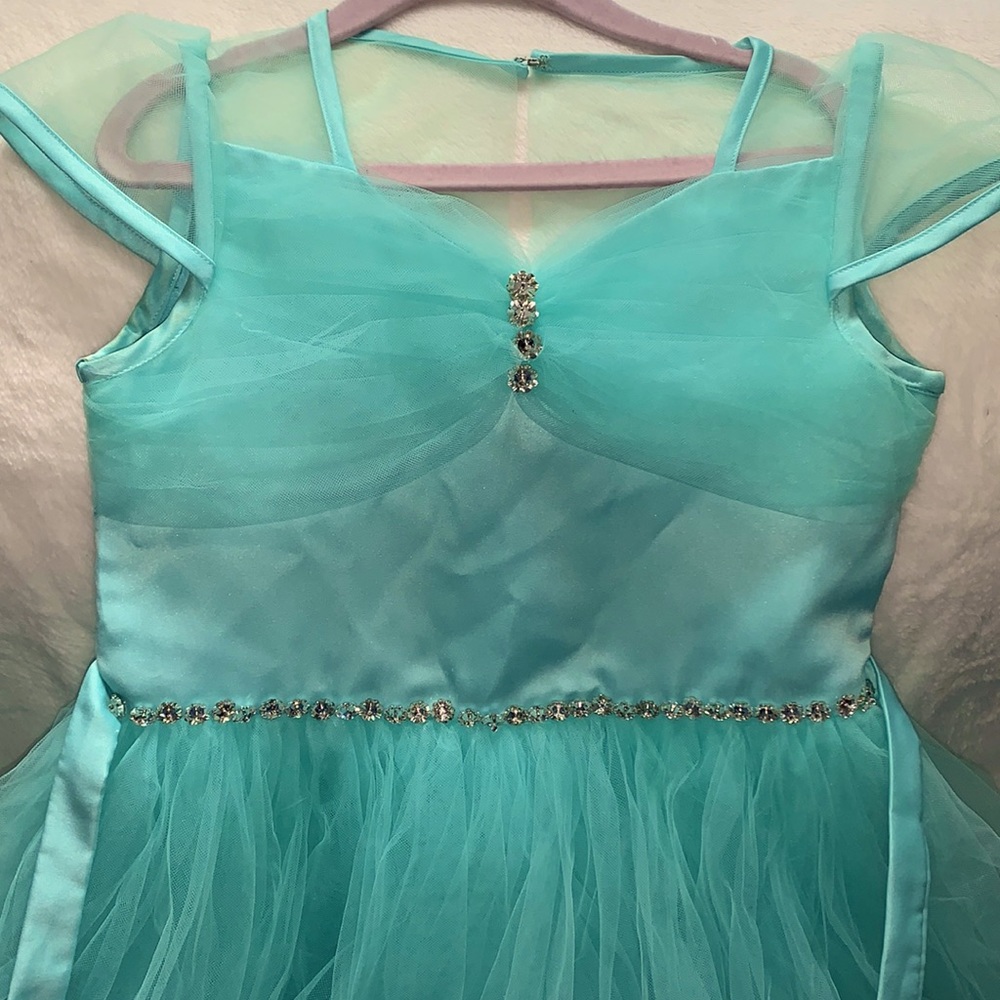 Beautiful Aqua blue dress for your little princess is priceless.